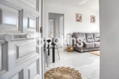 Zona de estar de Blanco Apartament per 6 persones a 5 minuts de la Platja Gran