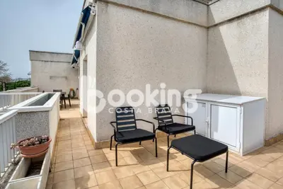 Un balcón o terraza de Blanco Apartament per 6 persones a 5 minuts de la Platja Gran