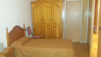 Cama o camas de una habitación en Hostal Bonaterra