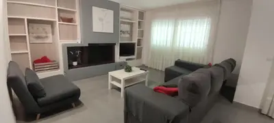 Una televisión o centro de entretenimiento en Apartamento Martin