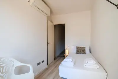 Cama o camas de una habitación en Flateli- Plaça Catalunya 2-1