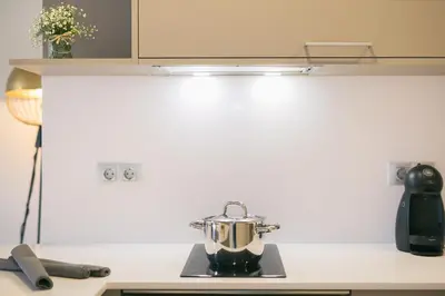 Una cocina o zona de cocina en Flateli- Plaça Catalunya 2-1