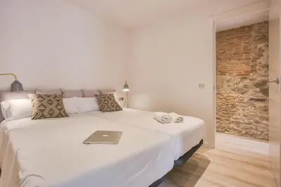 Cama o camas de una habitación en Flateli - Plaça Catalunya 42