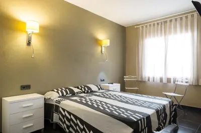 Cama o camas de una habitación en Les Formigues 3