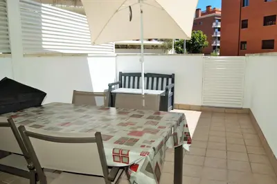 Un balcón o terraza de Apartamento Naiss Garden Family