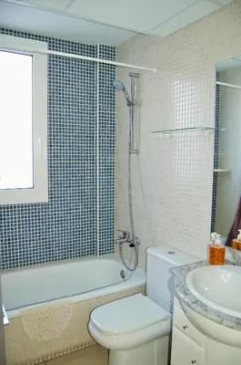 Un baño de Apartamento Naiss Garden Family