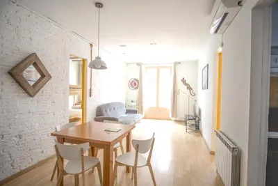 Zona de estar de La Lleona Apartment
