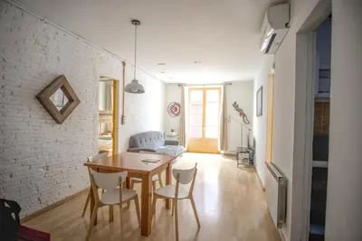 Zona de estar de La Lleona Apartment