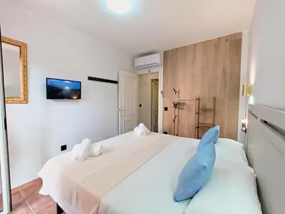Cama o camas de una habitación en MARITIM CENTRAL 