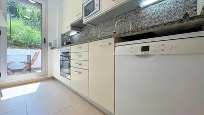 Una cocina o zona de cocina en Vivalidays Remei - Fenals - LLoret de Mar
