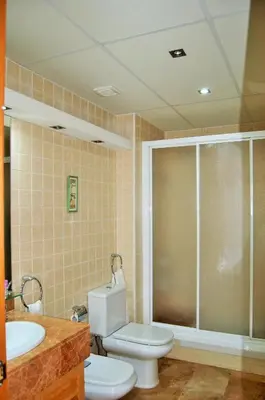 Un baño de Apartamento Ainara Garden Family