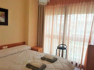 Cama o camas de una habitación en Apartamento Ainara Garden Family