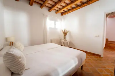 Cama o camas de una habitación en Deco - Casa Voltes Peratallada