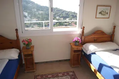 Cama o camas de una habitación en Lloret Apartments