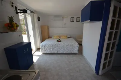 Cama o camas de una habitación en Lloret Apartments