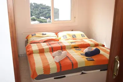 Cama o camas de una habitación en Lloret Apartments