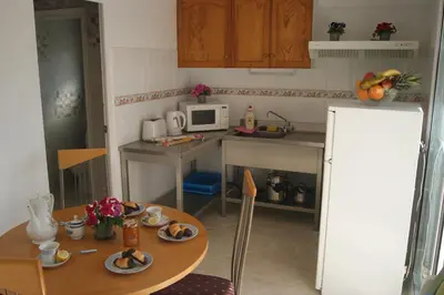 Una cocina o zona de cocina en Lloret Apartments