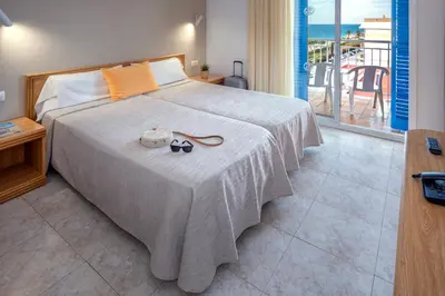 Cama o camas de una habitación en Hotel Sorrabona