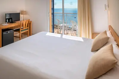 Cama o camas de una habitación en Hotel Sorrabona
