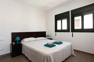 Cama o camas de una habitación en Lets Holidays AMAZING TRIPLEX SEA VIEWS in TOSSA