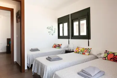 Cama o camas de una habitación en Lets Holidays AMAZING TRIPLEX SEA VIEWS in TOSSA
