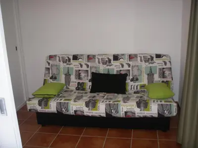 Cama o camas de una habitación en Los Pinos Apartament per 4 persones amb piscina comunitària a l'urbanització Los Pinos