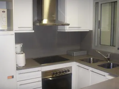 Una cocina o zona de cocina en Saromar II Apartament amb dues terrasses per 6 persones a 5 minuts de la Platja Gran