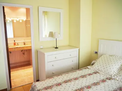 Cama o camas de una habitación en Saromar I Apartament amb gran terrassa, per 6 persones a 5 minuts de la Platja Gran