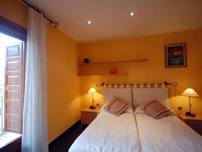 Cama o camas de una habitación en Lets Holidays CENTRIC APARTMENT with POOL in TOSSA