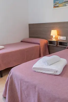 Cama o camas de una habitación en Casa 8 - Parc Sant Ramon, descanso y armonía