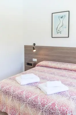 Cama o camas de una habitación en Casa 8 - Parc Sant Ramon, descanso y armonía