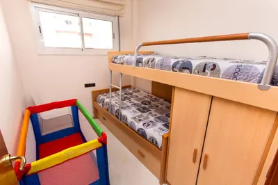 Litera o literas de una habitación en Central park Blanes
