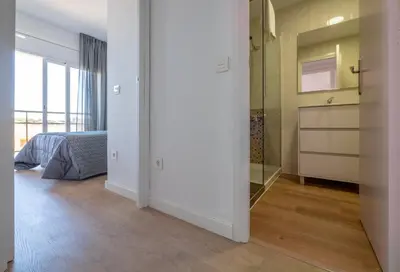 Cama o camas de una habitación en Apartamentos AR Melrose Place