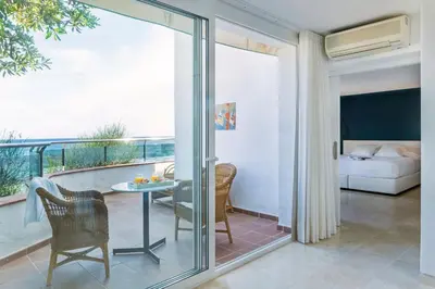 Cama o camas de una habitación en Hotel Costa Brava