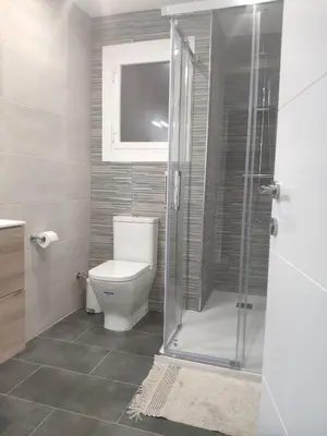 Un baño de Atico Condal