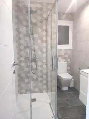 Un baño de Atico Condal
