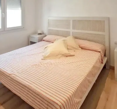 Cama o camas de una habitación en Charming House in Palamós near Beaches