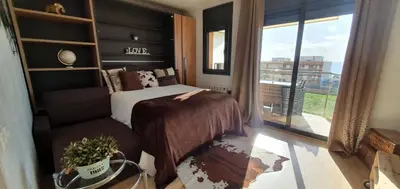 Cama o camas de una habitación en Apartment Beach Front Canet