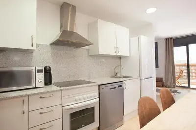 Una cocina o zona de cocina en Apartment Beach Front Canet
