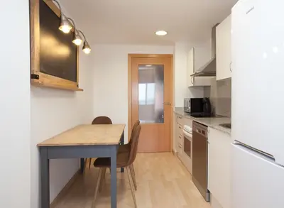 Una cocina o zona de cocina en Apartment Beach Front Canet