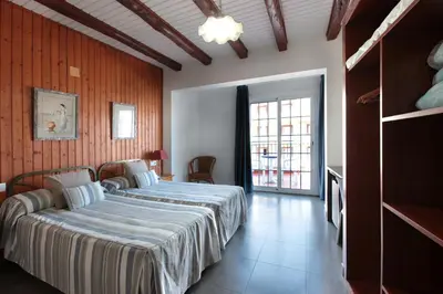 Cama o camas de una habitación en Hotel Marblau Tossa