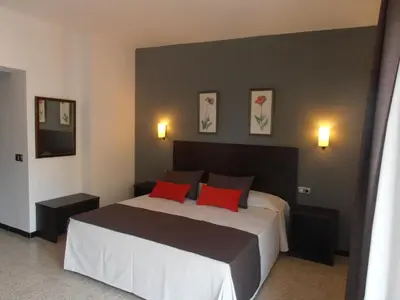 Cama o camas de una habitación en Hotel Marblau Tossa