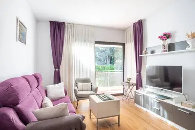 Una televisión o centro de entretenimiento en Apartment Sa Boadella beach, Lloret de Mar - Costa Brava