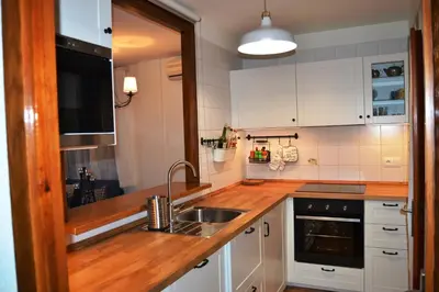 Una cocina o zona de cocina en Apartamento con Jardín Platja d'Aro