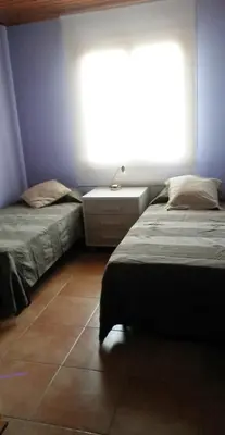 Cama o camas de una habitación en Casa Mar y Piscina (solo familias)
