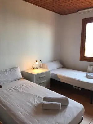Cama o camas de una habitación en Casa Mar y Piscina (solo familias)