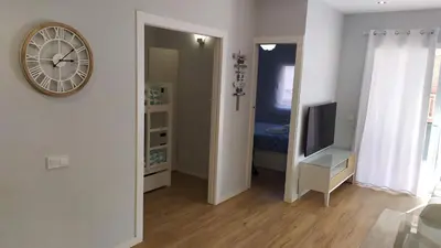 Una televisión o centro de entretenimiento en Apartamento Blanes