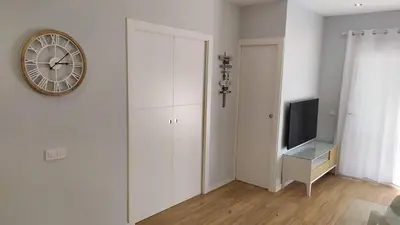 Una televisión o centro de entretenimiento en Apartamento Blanes