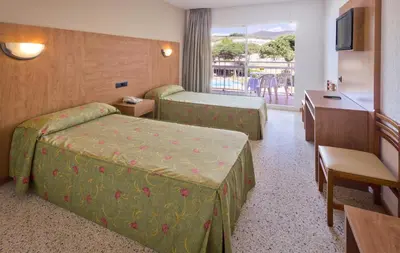 Cama o camas de una habitación en Hotel President