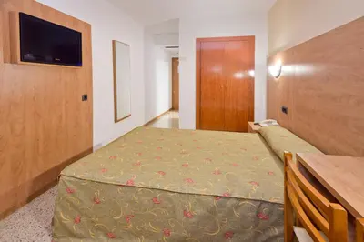 Cama o camas de una habitación en Hotel President